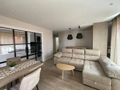 a living room with a couch and a table at El Roble 9 in Astorga