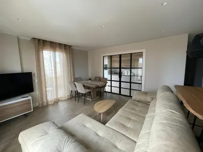 a living room with a couch and a table at El Roble 9 in Astorga