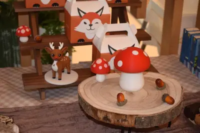 a toy forest with mushrooms and a deer on a table at HOTEL CANDOR in A Lama