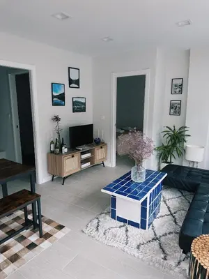 a living room with a couch and a table at Casa Amodiño in Belesar