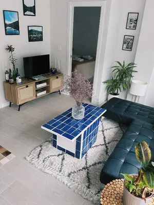 a living room with a couch and a table at Casa Amodiño in Belesar