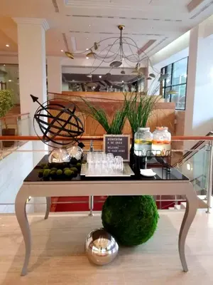 a table with food on it in a room at Oca Puerta del Camino Hotel in Santiago de Compostela