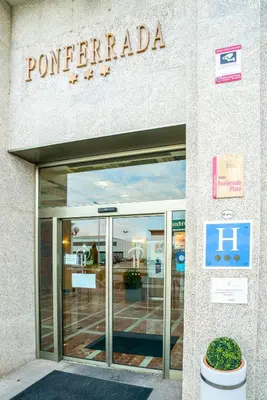 a entrance to a pocomedia store with a sign on it at Ponferrada Plaza in Ponferrada