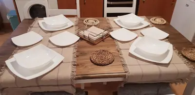 a bedroom with a white bed and a lamp at Piedad Fernandez Fernandez Gestion de Inmuebles - II in Burela de Cabo