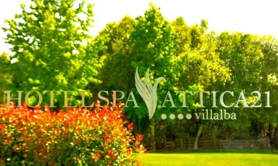 a sign for the hotel spa antigua in front of trees at Hotel Spa Attica21 Vilalba in Villalba