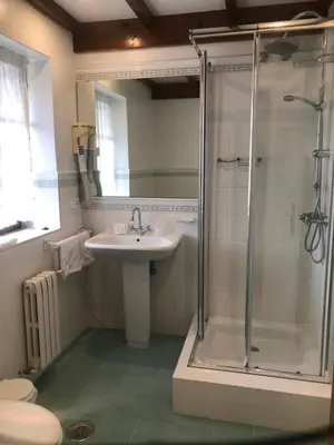 a bathroom with a sink and a shower at Casa Grande de Fuentemayor in Silleda