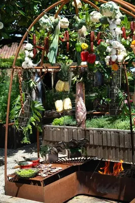 a display of vegetables and fruits in a garden at Casa Beatnik Country House in Santiago de Compostela