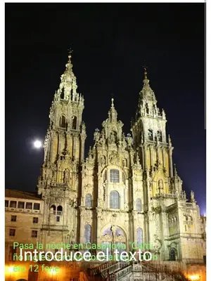 a large building with two towers at night at Casanova in Fene