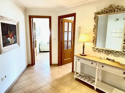 a room with a mirror and a table with a lamp at The Cliffs - Passion Eccehomo in Viveiro