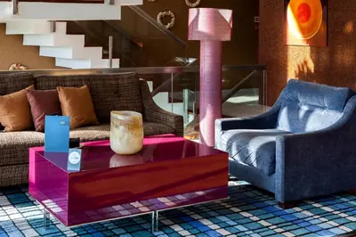 a living room with a couch and a table at Eurostars Vila de Allariz Hotel Balneario in Allariz