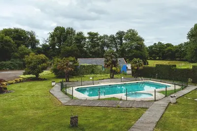 an overhead view of a swimming pool in a yard at Hotel Voar in Ribadeo