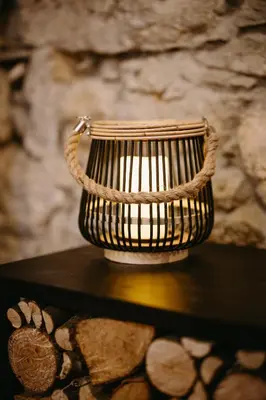 a wicker basket sitting on top of a table at Apartamentos Rurales La Casina del Fontan in Valle de Lago