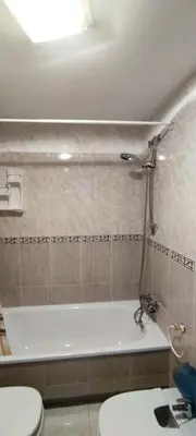 a bathroom with a tub and a toilet and a bath tub at MIRADOR DEL EO in Ribadeo