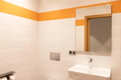 a bathroom with a sink and a mirror at Hotel Casa da Luz in Pastoriza