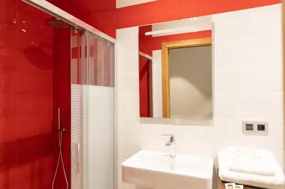 a bathroom with a sink and a mirror at Hotel Casa da Luz in Pastoriza