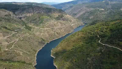 an aerial view of a river in a canyon at Armada Sacra A Teixeira in Ourense