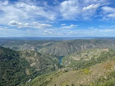 an aerial view of a mountain valley with a river at Armada Sacra A Teixeira in Ourense