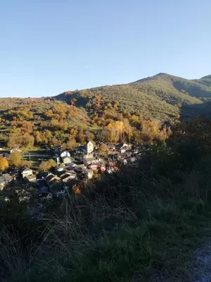 a small town in the middle of a hill at Casa del patio in Villanueva de Valdueza