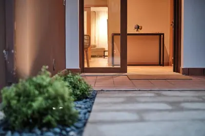an open door of a house with a view of a hallway at Yuhom, casas con alma. Xacedos 3 in Miño