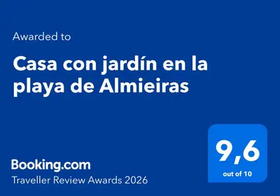 a screenshot of a cell phone with the words casa con janin en la at Casa con jardín en la playa de Almieiras in Fene