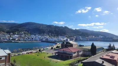 a view of a city and a body of water at Duerming Ría de Viveiro in Viveiro
