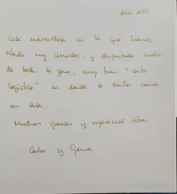 a handwritten letter with handwriting on a white paper at Quintana&lev in Viveiro