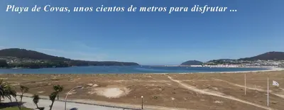 a view of a beach with a body of water at Quintana&lev in Viveiro