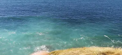 a large body of water with a person in front of it at Quintana&lev in Viveiro