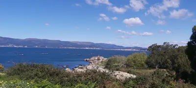 a view of a large body of water with boats at Quintana&lev in Viveiro