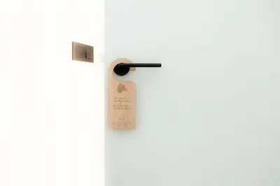 a white door with a sign on it at Albatros in Puentedeume