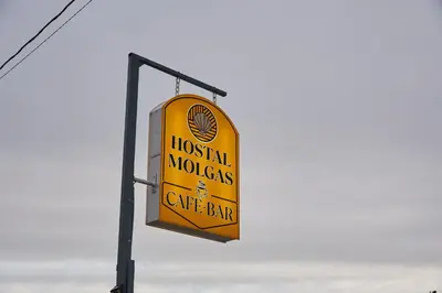 a sign for a hospital molecules and a cafe bar at Hostal Molgas in A Medorra