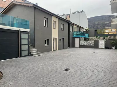 an empty parking lot in front of a house at Luxury Barco de Valdeorras in Vegamolinos