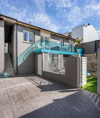 a house with a glass staircase on the side of it at Luxury Barco de Valdeorras in Vegamolinos