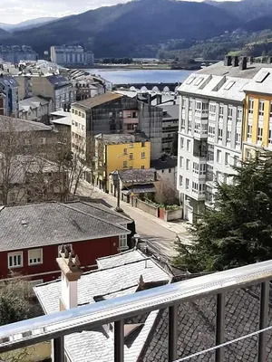 a view of a city from a balcony at Lazaro Sol in Viveiro