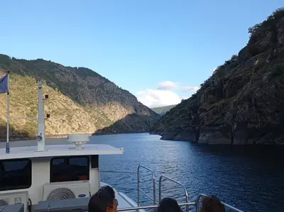 a group of people on a boat on a river at O Noso Lar - RIBEIRA SACRA in Nogueira de Ramuin
