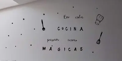 a white wall with some writing on it at Casa Tarrazo II in Monforte de Lemos