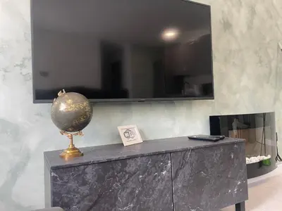 a table with a mirror and a ball on top of it at Alojamiento Barco de Valdeorras in Vegamolinos