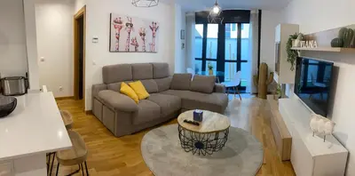 a living room with a couch and a table at VIANA in Monforte de Lemos