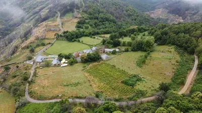 an aerial view of a farm on a mountain at O Busto Aldea Rural in A Pobra do Brollon