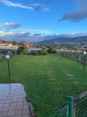 a park with a fence and a field with trees at Chalet casa con piscina en ARBO Vigo in Arbo