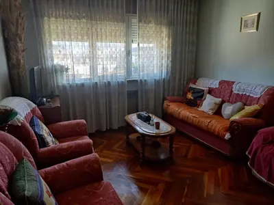 a living room with two couches and a coffee table at Casa Jesús in Sarria