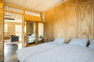 a bedroom with a large bed in a room at Casona con Jacuzzi in Betanzos