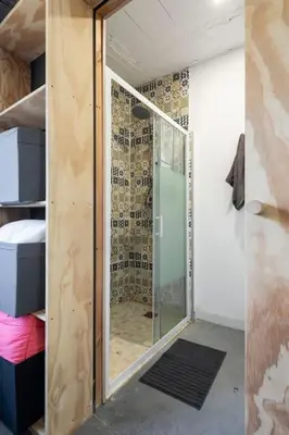 a bathroom with a glass shower in a room at Casona con Jacuzzi in Betanzos