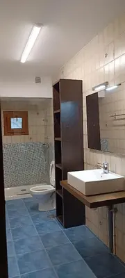 a bathroom with a sink and a toilet at Casa Vilas, Santiago de Compostela in Santiago de Compostela