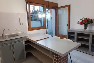 a kitchen with a sink and a counter top at Casa Vilas, Santiago de Compostela in Santiago de Compostela