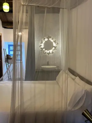 a bathroom with a sink and a mirror at HOTEL CASAS DA FORTALEZA Casa do Garda in Outeiro de Rei