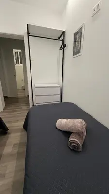 a bedroom with a bed with a towel on it at Jabego2 in Sarria