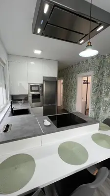 a kitchen with a white counter top in a room at Jabego2 in Sarria