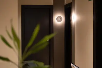 a close up of a door with a light on it at HOTEL RIO LEA in Castro de Rey