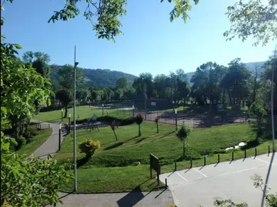 a view of a park with a tennis court at Piso turístico Baralla in Baralla